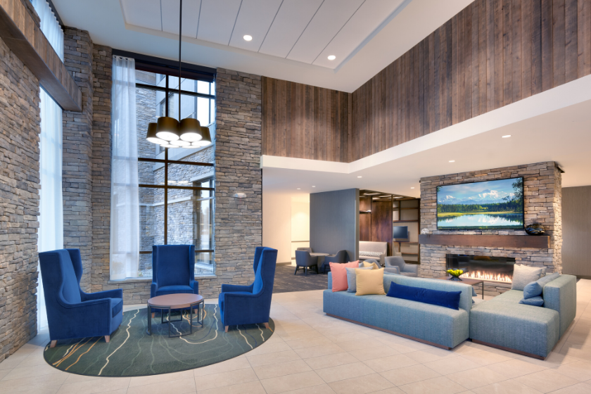 Multiple seating options and lounge areas in the lobby of the Hyatt Place in Anchorage.
