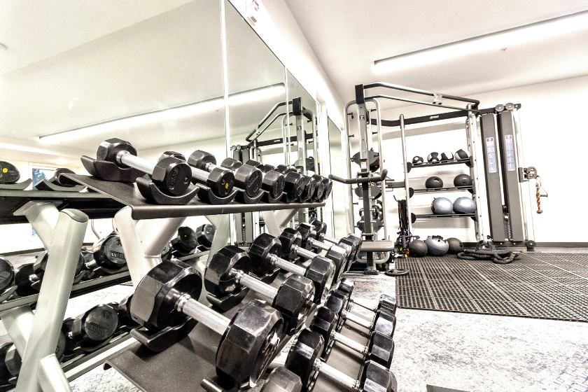 A rack of dumbbell weights in the fitness center at The Flats at Riverwoods in Provo, UT.