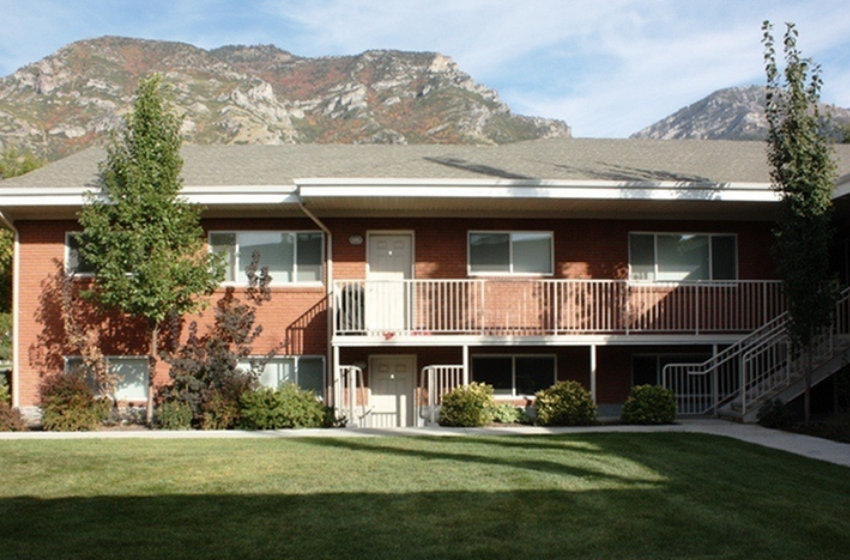 Red brick split-level apartment housing from Hallady Living in Orem and Provo.